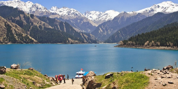 Tianchi Lake in Urumqi, Xinjiang, China mountain range Xinjiang luxury rail journey Mayflower.