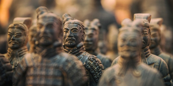 Rows of life-sized Terracotta Warriors displayed in an excavation hall in Xi’an, China.