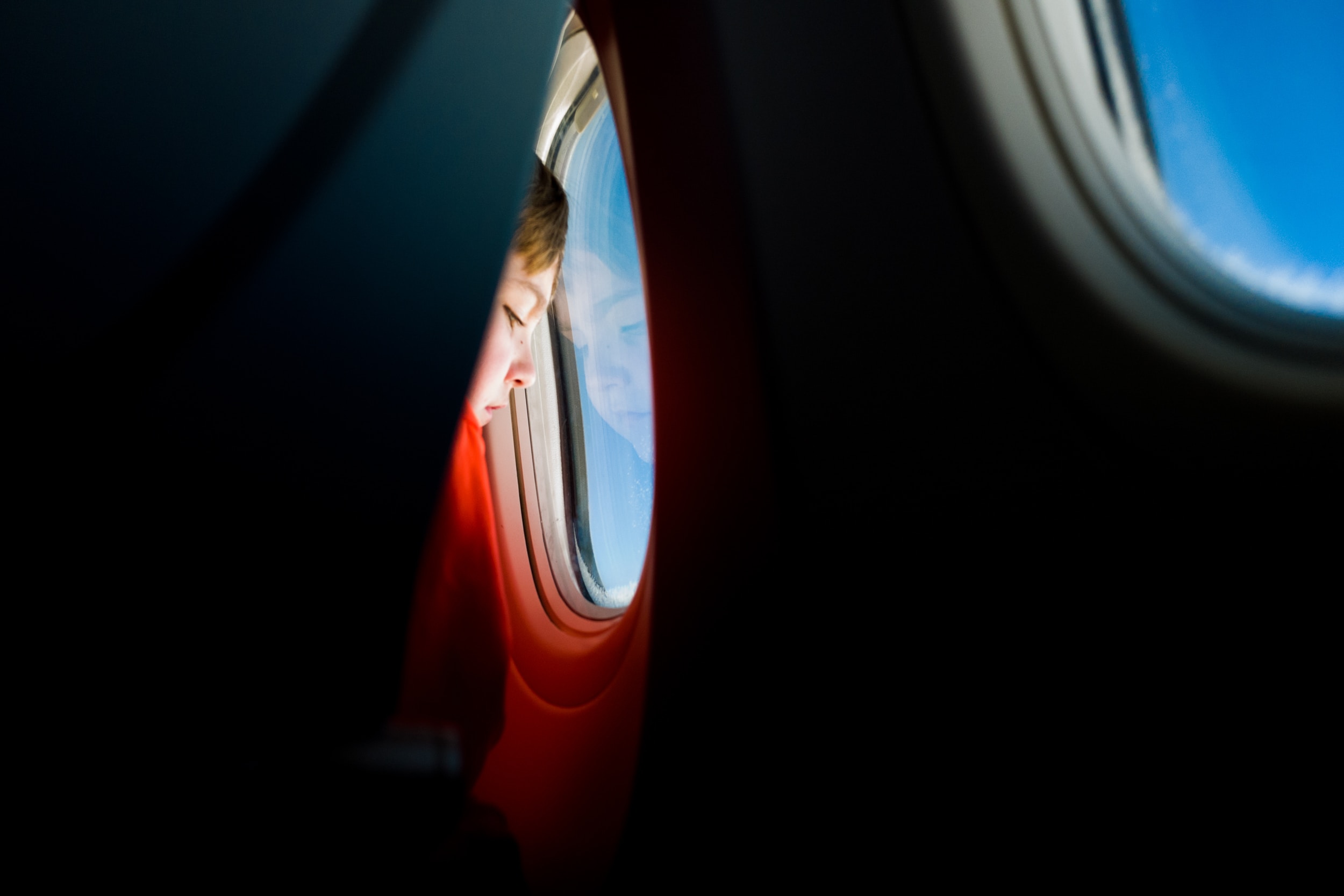 How To Survive A 12-Hour Plane Trip With Kids Banner Image